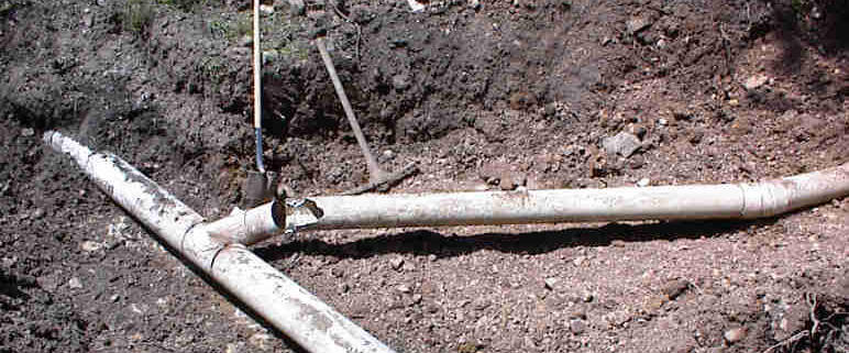 broken lateral line causing backups in septic tank