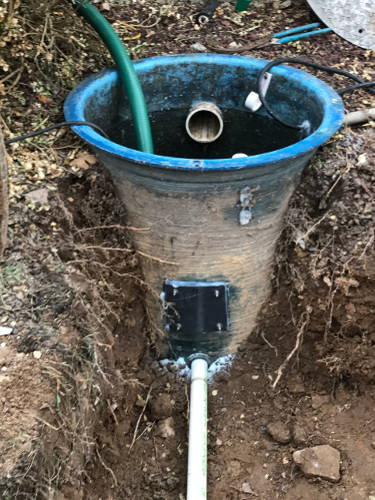 new discharge pipe installed with waterproof fittings 9-29-17
