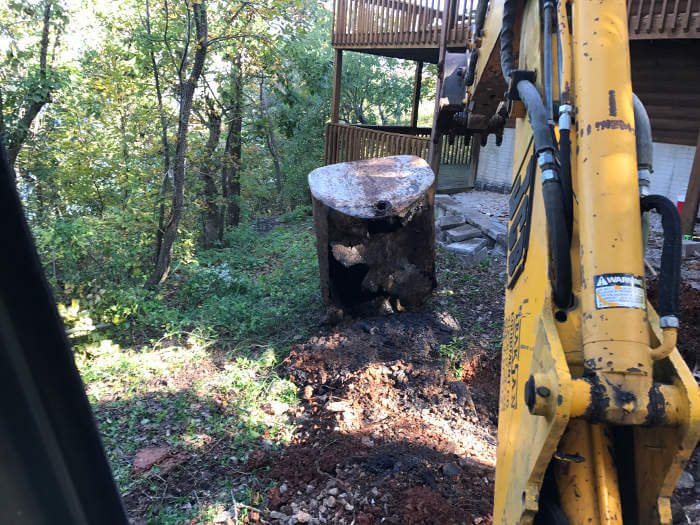 removing metal septic tank with backhoe 1-2-2017