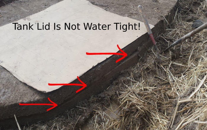 septic tank lid not water tight causing backups