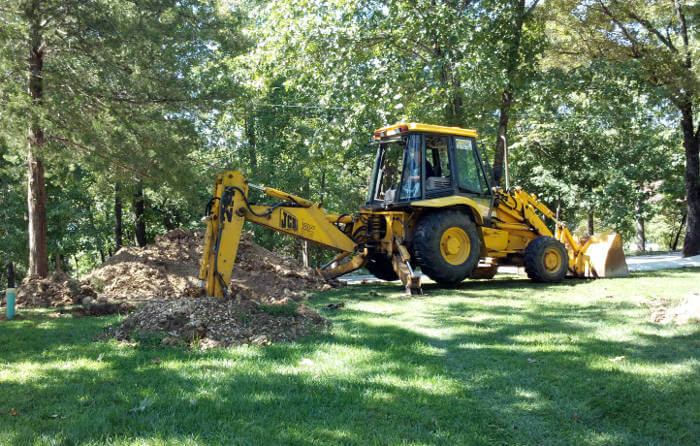 septic system repair table rock lake using backhoe