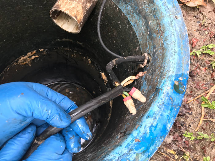 improper wiring methods used in grinder pump basin