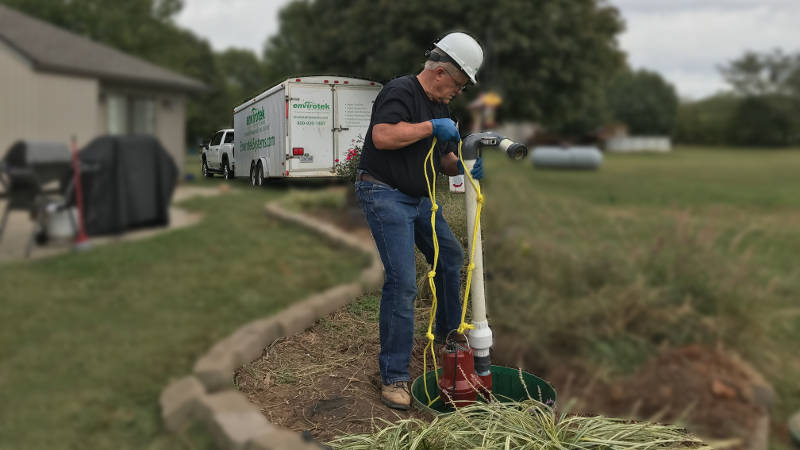 installing sewage pump in basin