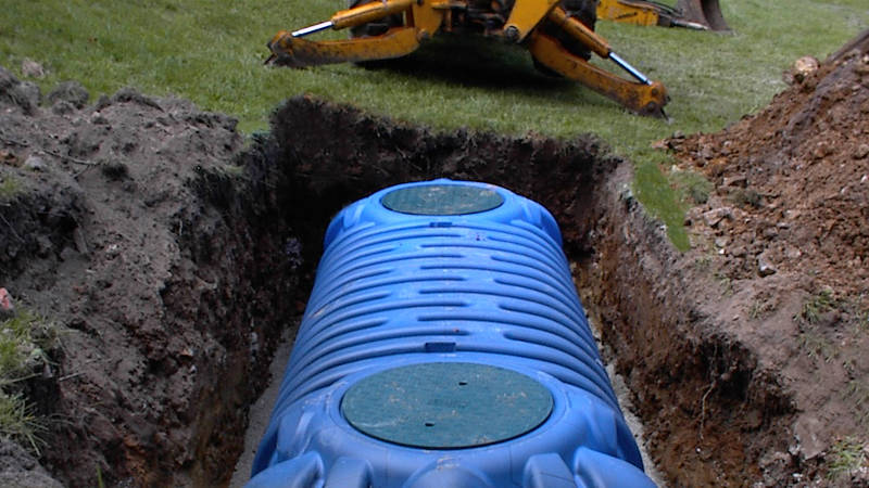 installing tank for septic system in Nixa, MO